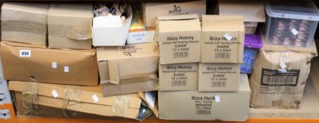 A quantity of assorted toiletries to include tanning mousse, nail polish and Starburst scented