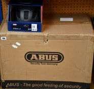 Eight boxed as new Abus Hyban Helmet 2.0 Titan (M).