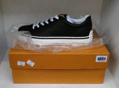 A pair of as new boxed Tod's Allacciata Bassa casual sneaker in black (UK 8).