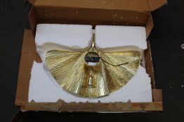 An Eichholtz Las Palmos wall lamp.