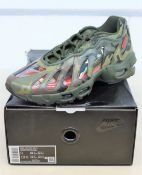 A pair of as new Nike x Supreme Air Max 96 / S in Camo (Size UK 8).
