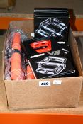 Six as new DMR Bikes V8 pedals in Red and Six as new DMR Bikes Deathgrips (5x Orange, 1x Blue).