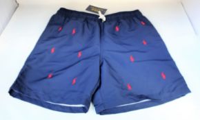 Four pairs of youths as new Ralph Lauren Polo Traveler shorts (All 14-16 years).