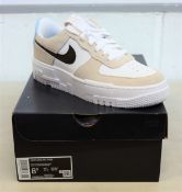 A pair of women's boxed as new Nike Air Force 1 Pixel Sneakers in Desert Sand and Dark Cinder-