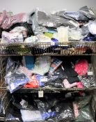 A large quantity of assorted new clothing and related items (Basket not included).