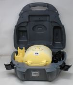 A Medela symphony double electric breast pump in a carry case.