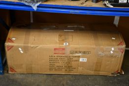 A Lola Storage ottoman in Grey.