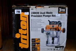 A Triton 2400w dual mode precision plunge router.