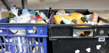 Two boxes of assorted toiletries to include shower gels, shampoos, scrubs and creams.
