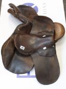 Two pre-owned unbranded horse saddles.