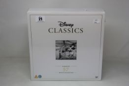 A sealed as new Disney Classics 57 disc complete movie collection box set.