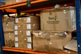 A shelf of miscellaneous electrical items, valves and other related items.