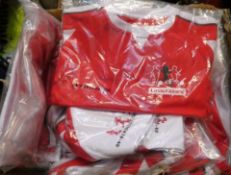 Thirty sets of children's Little Kickers football shirt and shorts sets together with assorted