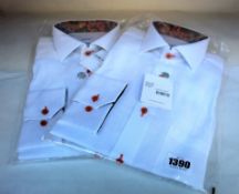 Two as new Oscar of Sweden shirts (Sizes 40 and 44).