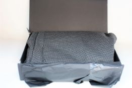 A pair of men's as new Porsche Design Houndstooth pants (EU 54) in box.