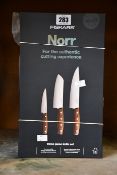 Three Fiskars Norr three piece knife sets.