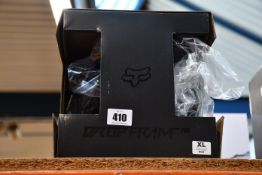 An as new Fox Racing Dropframe Pro Helmet, CE in black (XL).