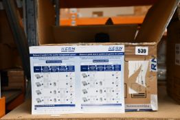 A Kern counting scale with testing block, shore hardness tester and a Kern lead-acid battery.