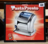 An as new Imperia Pasta Presto electric pasta machine.