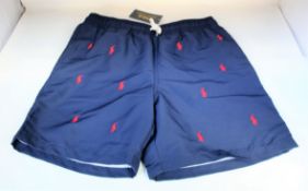 Four pairs of youths as new Ralph Lauren Polo Traveler shorts (All 14-16 years).