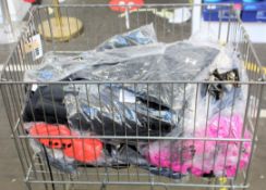 A basket of assorted Under Armour sports wear to include tops/shorts/socks and related items in