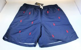 Four pairs of youths as new Ralph Lauren Polo Traveler shorts (All 14-16 years).