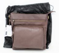 An as new Treats Ellie common natural chestnut leather bag with dust cover.