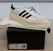A pair of as new Adidas Beyonce Superstar (UK 5).