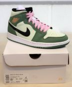 A pair of women's boxed as new Nike Air Jordan 1 Mid SE in Dutch Green, black and barely green (UK