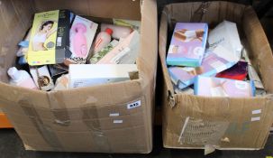 Two boxes of miscellaneous items for ladies to include sex aids, cosmetics/toiletries and