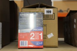 Ten packs of as new Epson glossy photo paper (80 sheets).