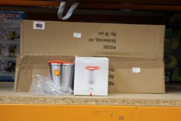 Forty as new XD design insulated promotional travel mugs with Shell logo.