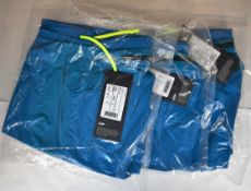 Three pairs of as new Gore R5 2in1 shorts (M).