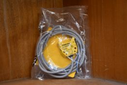 An as new Turck inductive proximity sensor (Ni4-DS20-2AP6X2, 165022).