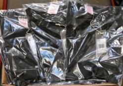 Eighteen children’s as new Adidas black T-shirts (All 11-12 years).