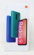 A pre-owned Xiaomi Redmi 9 64GB in Carbon Grey (FRP clear) (Box, UK plug, USB-C cable and case