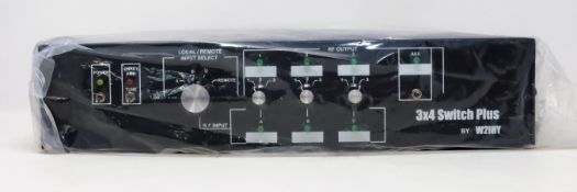 A boxed as new W2IHY 3x4 switch plus for radio equipment (Power cable and control cable included).