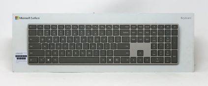 Four boxed as new Microsoft Surface Keyboards in Grey (Portuguese language layout) (P/N: 3YJ-00011