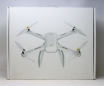A boxed as new Xiaomi Mi 4K Quadcopter Drone (m/n: WRJTZ02FM) (UK plug adaptor required).