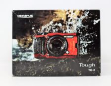 A boxed as new Olympus Tough TG-6 Digital Camera in Red (Box opened).