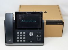 A boxed as new Yealink SIP-T48S Ultra Elegant Business IP Phone in Black (Box opened).