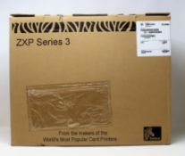 A pre-owned Zebra ZXP Series 3 Single Sided Card Printer (P/N: Z31-00000200EM00) (Box, cables and CD