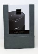 A boxed as new Bose 300 Wireless Home Speaker in Black (Box sealed).
