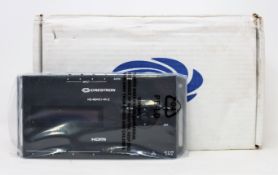 A boxed as new Creston 4 port HDMI distribution amplifier (PN: HD-MD4X1-4K-E) (Box damaged).