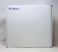 A boxed as DoorBird D2101V Flush-Mount IP Video Door Station in V4A Brass Polished Stainless