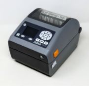 A pre-owned Zebra ZD620 Direct Thermal Wi-Fi/Bluetooth/USB/Serial/Ethernet Desktop Printer with