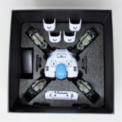 A boxed Reach Robotics Mekamon educational robot in white. (possibly pre-owned) (box damaged).