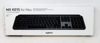 A boxed as new Logitech MX Keys keyboard for Mac in black/space-grey (box opened) (damage to outer