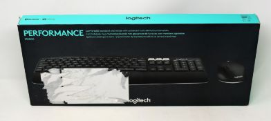 A boxed as new Logitech MK850 Wireless Keyboard and Mouse in Black (Box sealed, some damage to