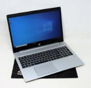 A pre-owned, boxed 15